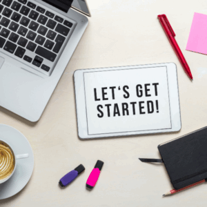 Tablet displaying 'Let's Get Started' on a desk.