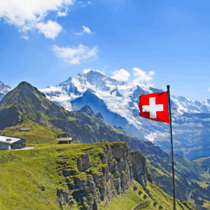 Swiss flag in scenic mountain landscape